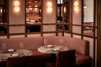 Banquette with mirrored panels above