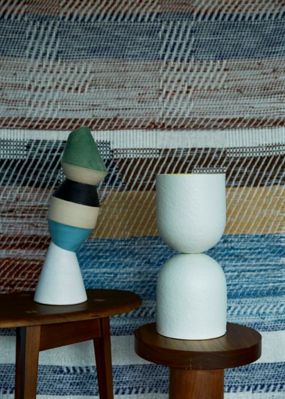 Curved white lamp from Palefire Studio's U/V Collection