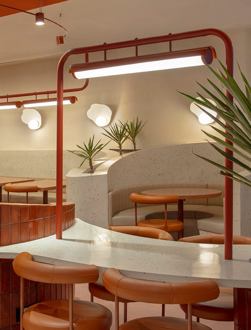 Tables and chairs inside a restaurant