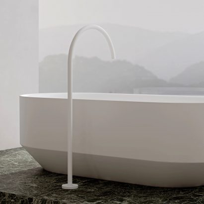 White RYO bathtub on a green marble slab