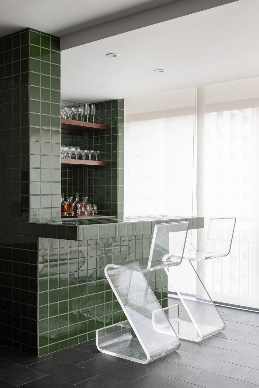 Green-tiled bar