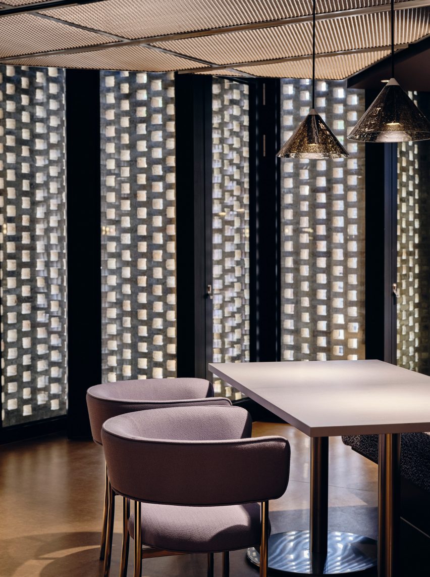 Table between brickwork in TOG at Borough Yards by Studio David Thulstrup