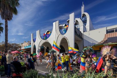 Image of a pride parade passing The Victorian Pride Centre