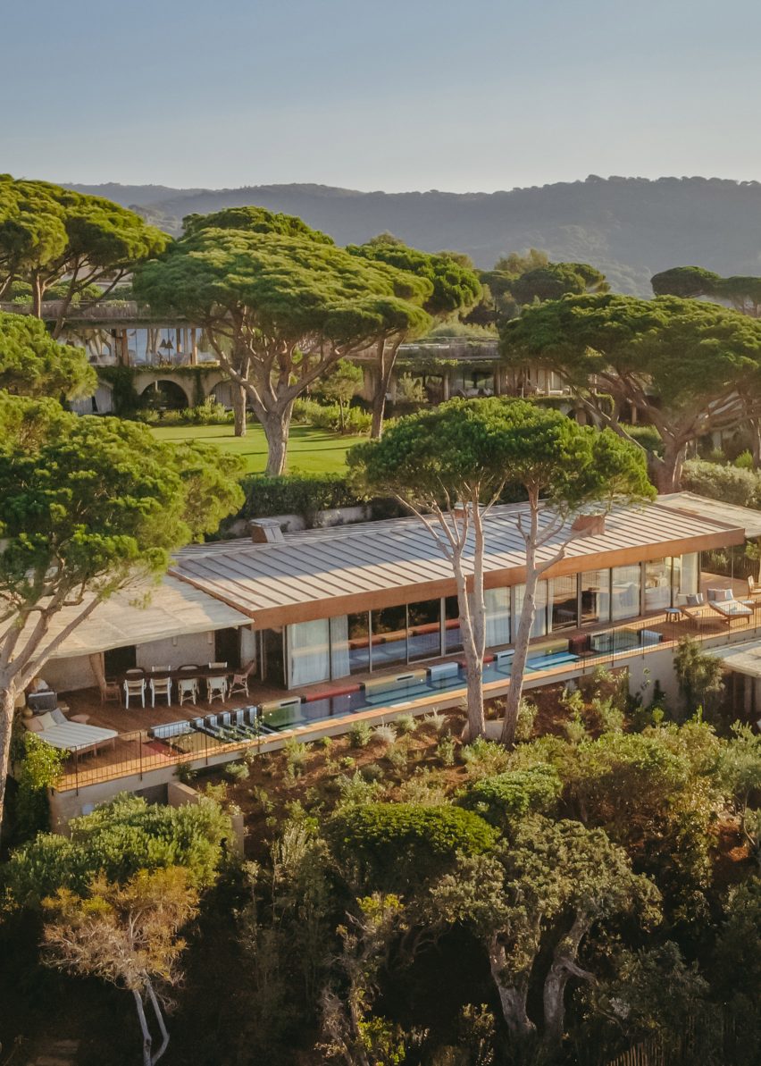 Villa W nestled in a hillside