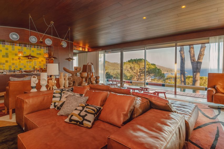 Tan leather sofas in a hotel lobby