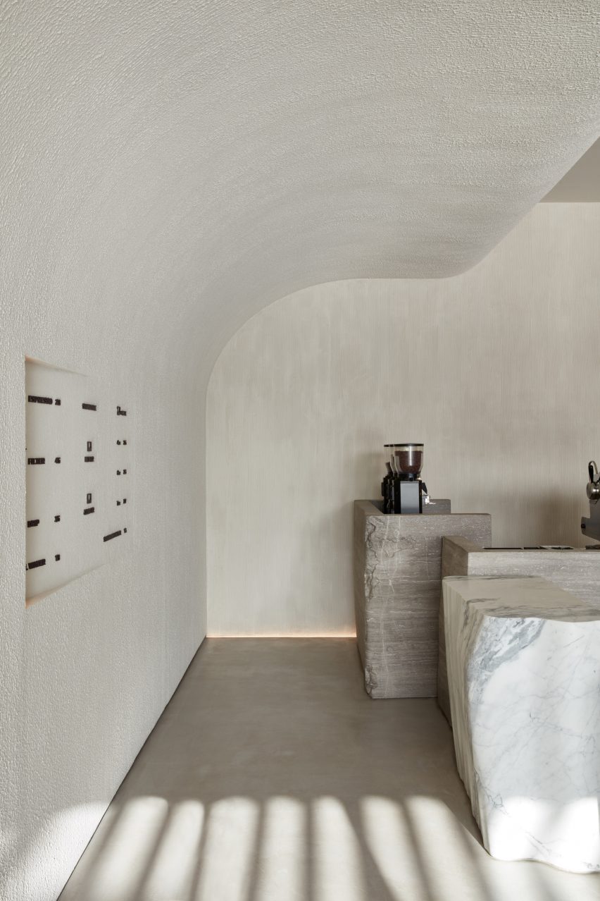 Minimalist interior of VSHD's Orijins coffee shop in Dubai