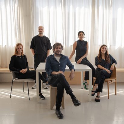 Photograph showing group of people in room