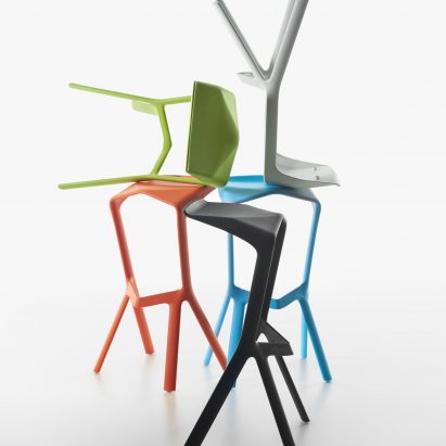 Colourful polypropylene stools on top of each other