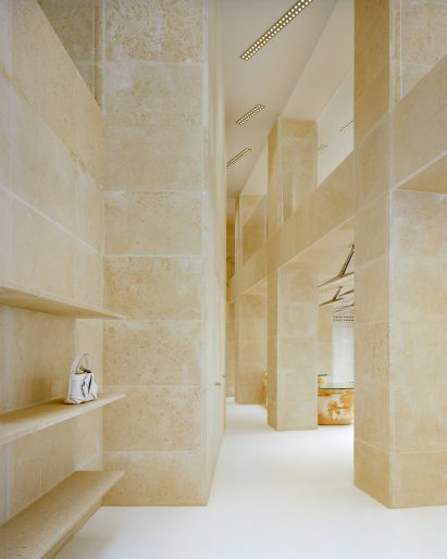 Interior image of the limestone-clad Acne Studios Rue Saint Honoré