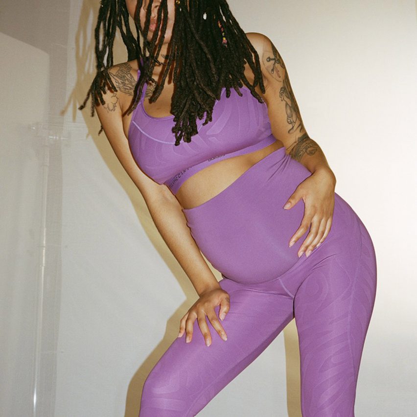 A pregnant woman wearing Adidas maternity collection