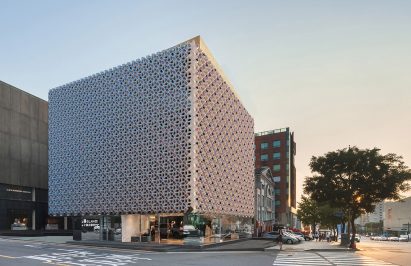Render of building clad in the modular terracotta facade system