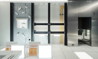Shoes are pictured attached to the walls of the Axel Arigato shop