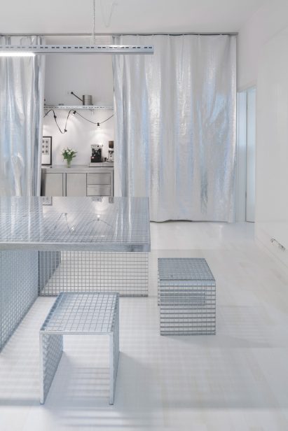 Office interior with metallic curtain by Buero Wagner