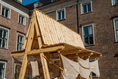 Close up of the pavilion's timber roof structure and hemp wings