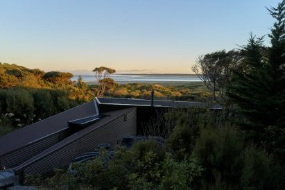 Corrugated-metal exterior of Omaui Beach house