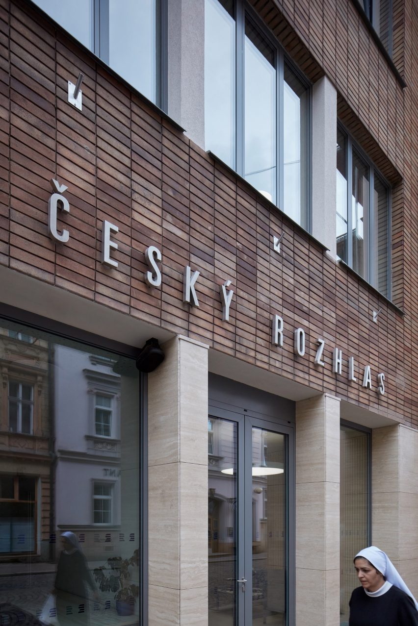 Photograph showing detail of narrow facade of building onto street