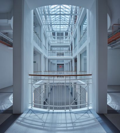 Photograph showing coolly-lit circulation space