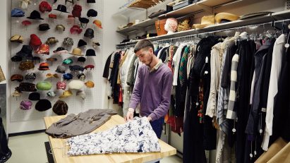 Fashion student in a textile workshop with clothing