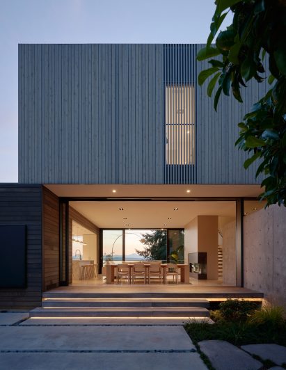 Concrete and stained cedar exterior of family home in Seattle