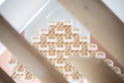 Planks of cross-laminated timber arranged like a puzzle
