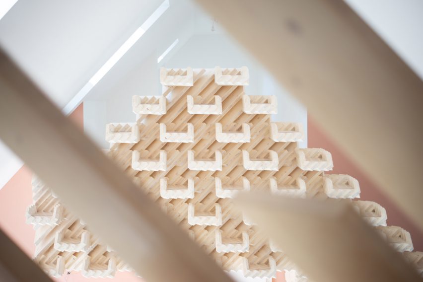Planks of cross-laminated timber arranged like a puzzle