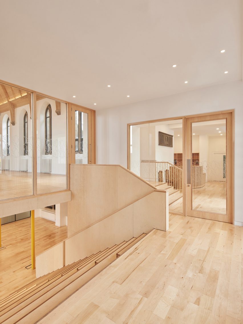 Photograph showing entrance area, stairs to ground floor and main hall access area