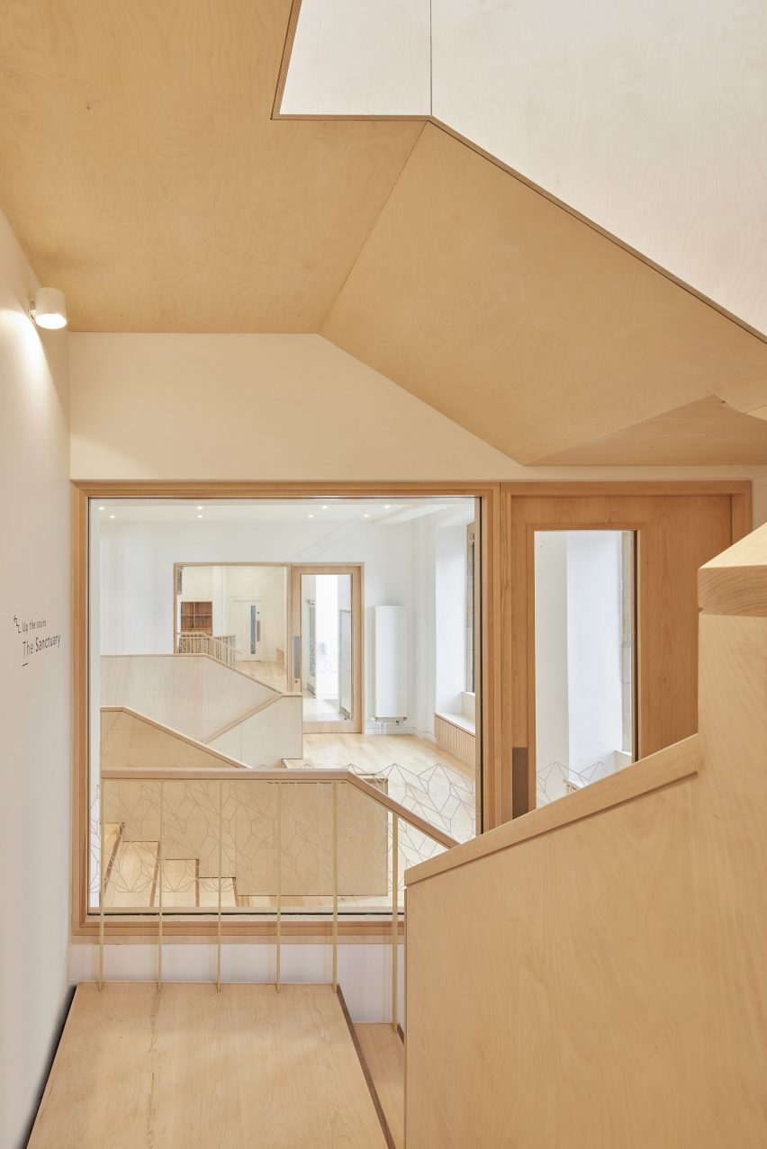 Photograph showing entrance area, stairs to ground floor and main hall access area