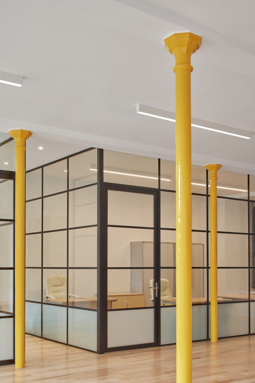 Photograph showing detail of lower ground floor meeting rooms with yellow columns