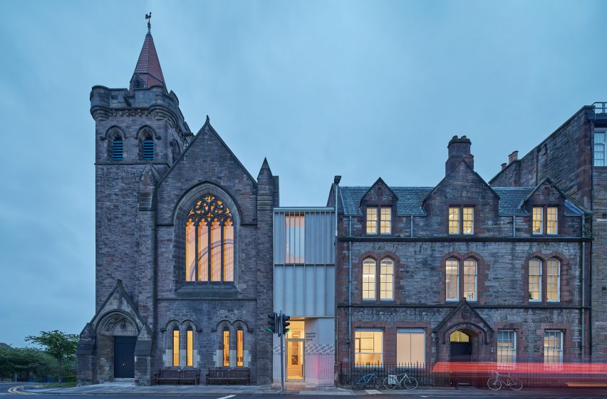 Photograph showing the exterior of the building complex with link building in centre