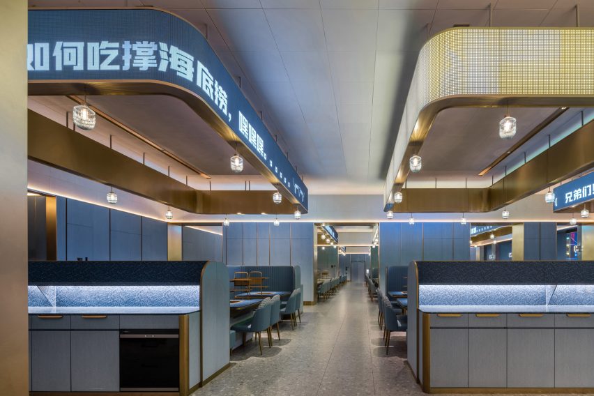 Shenzhen's Haidilao restaurant by Vermilion Zhou Design Group features blue-green interiors