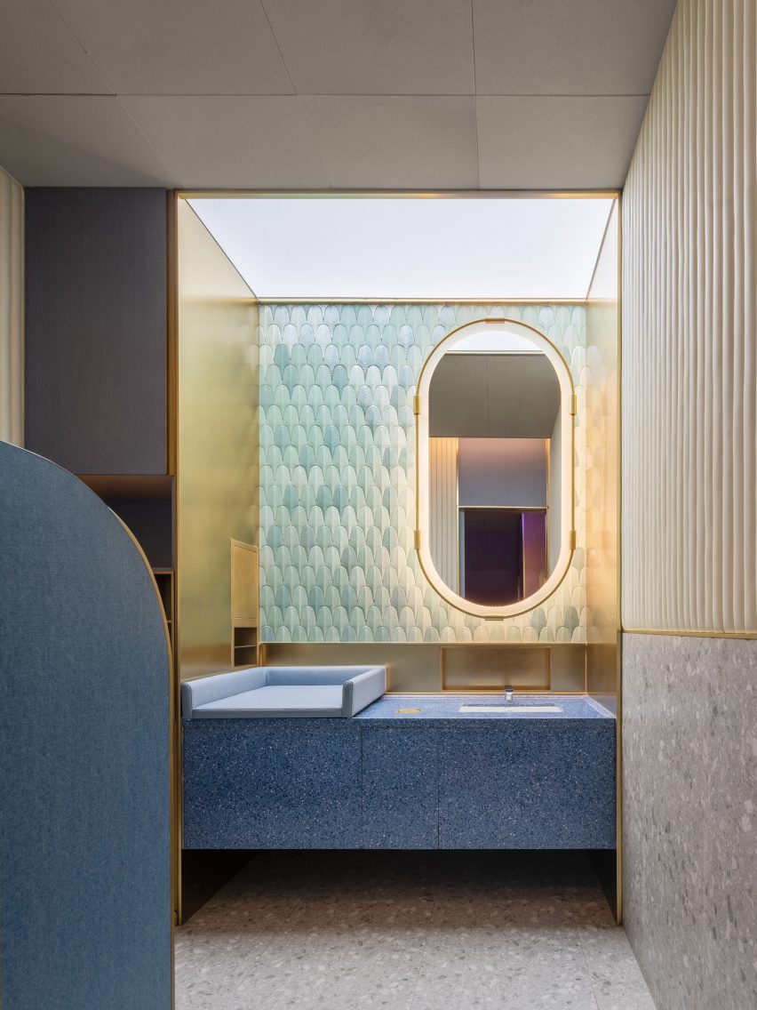 Shenzhen's Haidilao restaurant by Vermilion Zhou Design Group features blue-green interiors