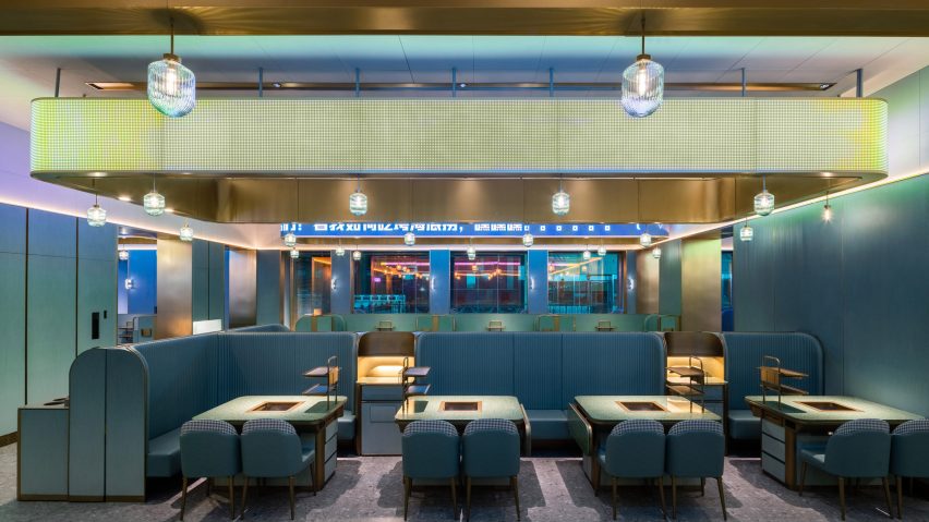 Shenzhen's Haidilao restaurant by Vermilion Zhou Design Group features blue-green interiors