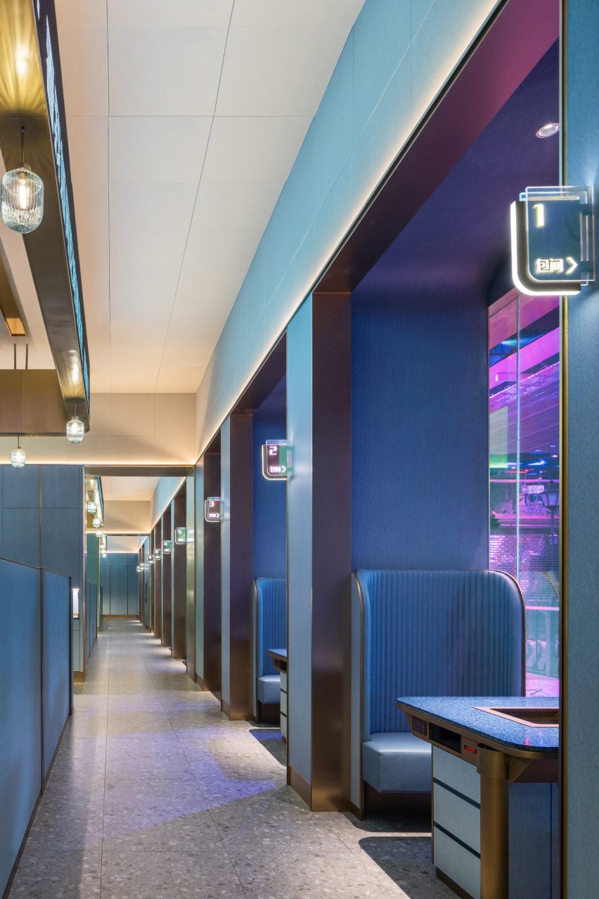 Shenzhen's Haidilao restaurant by Vermilion Zhou Design Group features blue-green interiors