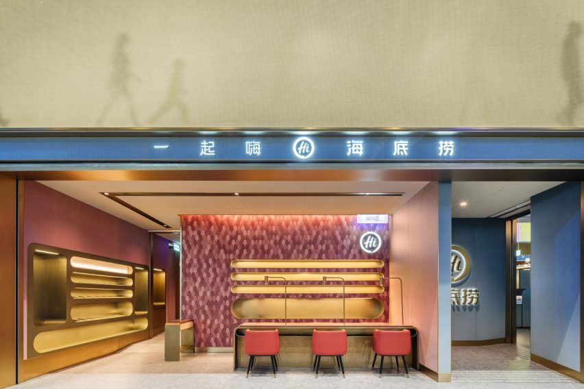 Shenzhen's Haidilao restaurant by Vermilion Zhou Design Group features blue-green interiors