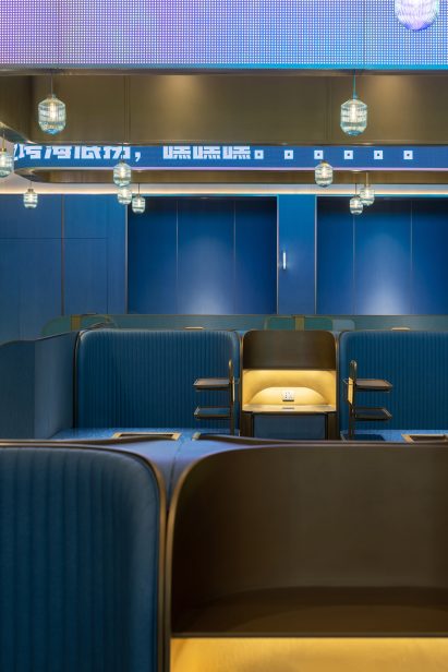 Shenzhen's Haidilao restaurant by Vermilion Zhou Design Group features blue-green interiors
