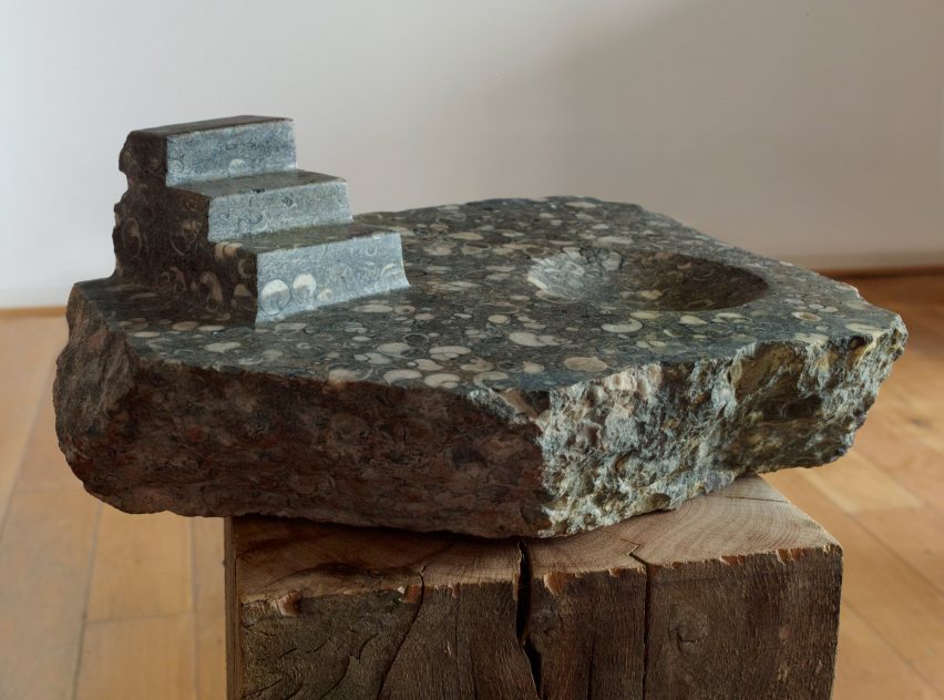 Marble sculpture in flecked stone