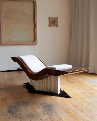 A reclining chair made from wood