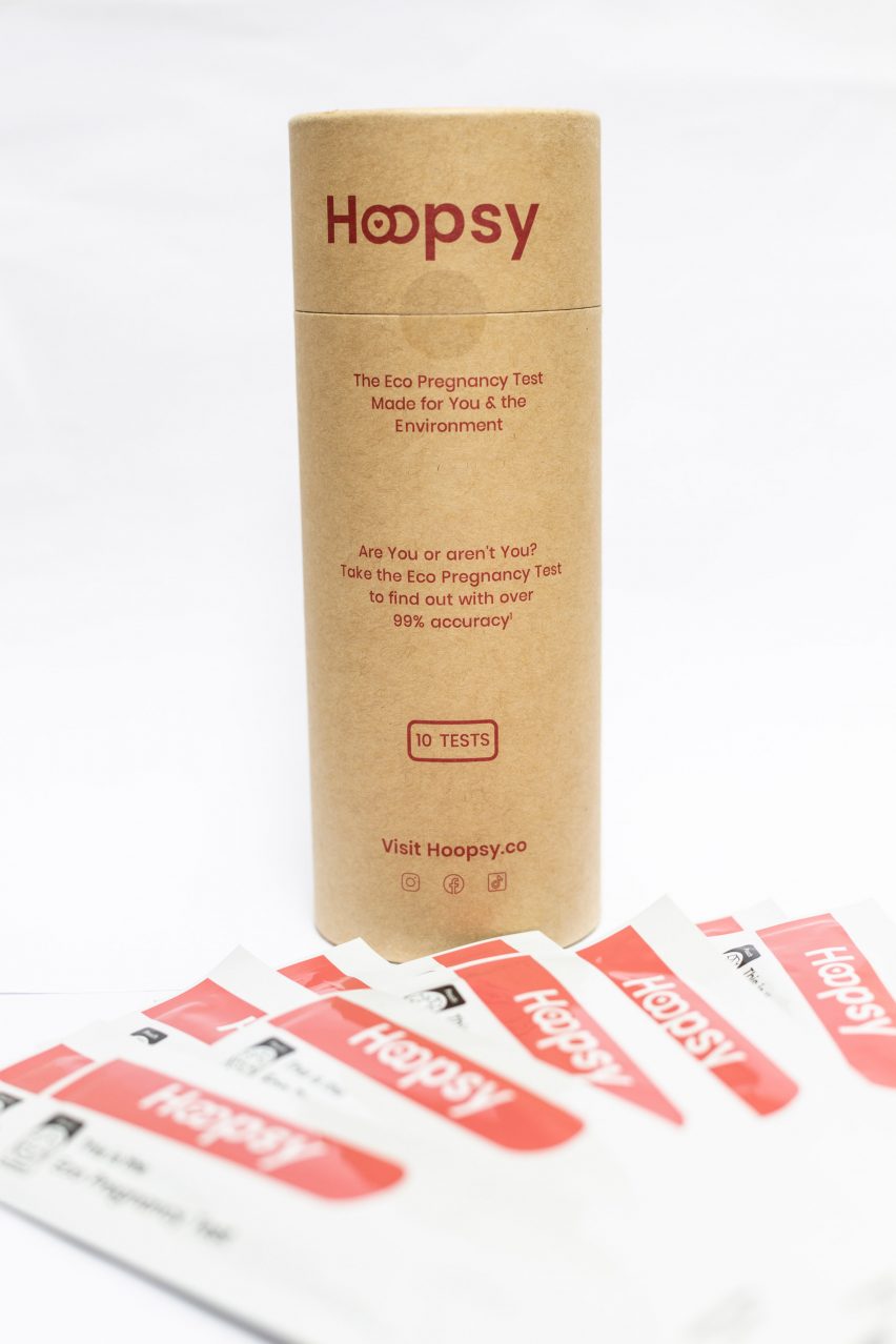 Cylindrical Hoopsy container with 10 test packets in front