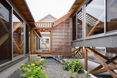 Timber corridor over garden in Nara City house designed by KKAA YTAA