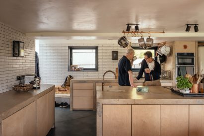 Kitchen with concrete cabinetry