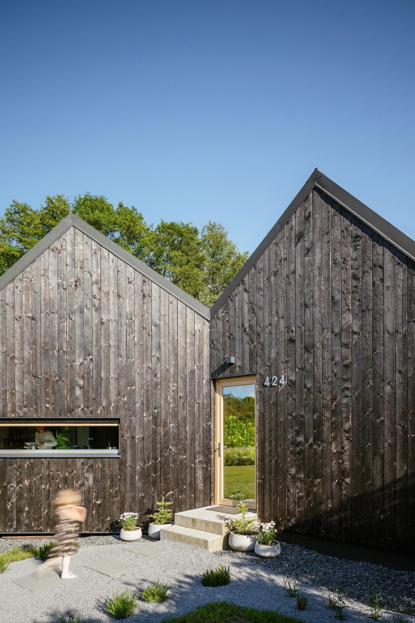 Exterior of House with In-Law Suite by KLAR