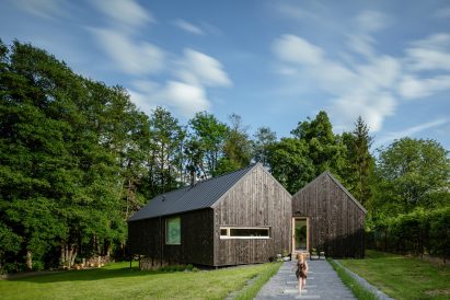 Exterior of House with In-Law Suite by KLAR