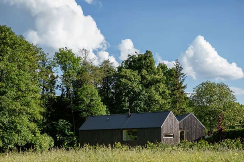 Exterior of House with In-Law Suite by KLAR