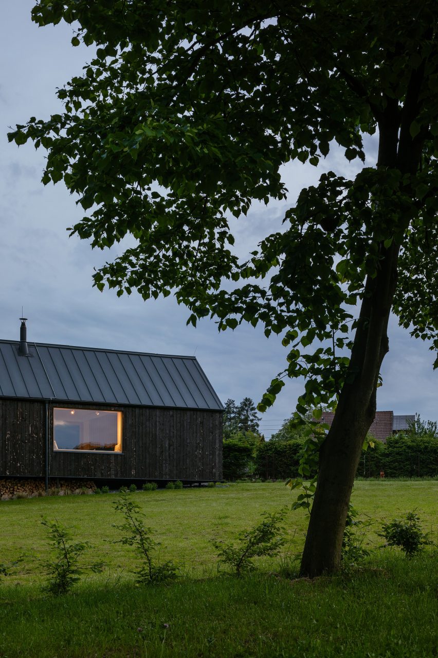 Exterior of House with In-Law Suite by KLAR