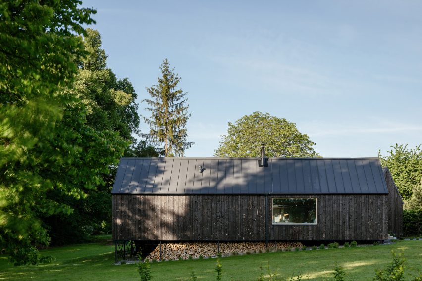 Exterior of House with In-Law Suite by KLAR
