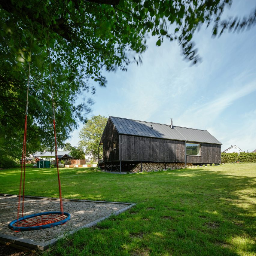 Exterior of House with In-Law Suite by KLAR