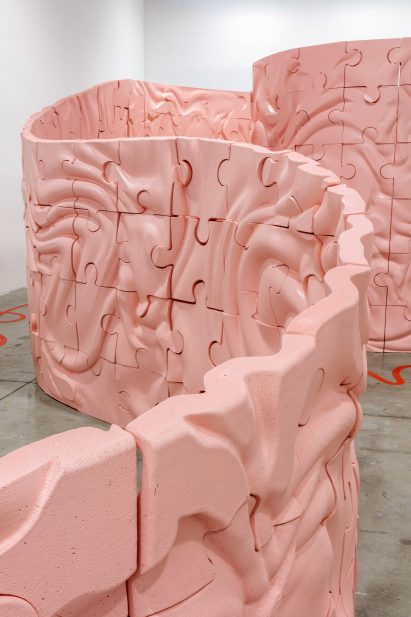Aerial view on the curving walls of the Intentionally Opaque installation
