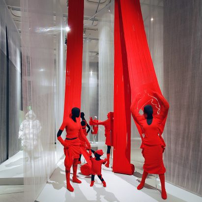 King and Queen red garments by A-POC from the Future Beauty exhibition