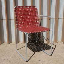 Steel-frame chair upholstered with red firehose designed by Local Works Studio for Maggie's Southampton