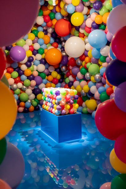 Robert Moy Brooklyn Balloon Company balloon filled room with trunk for Louis Vuitton exhibition